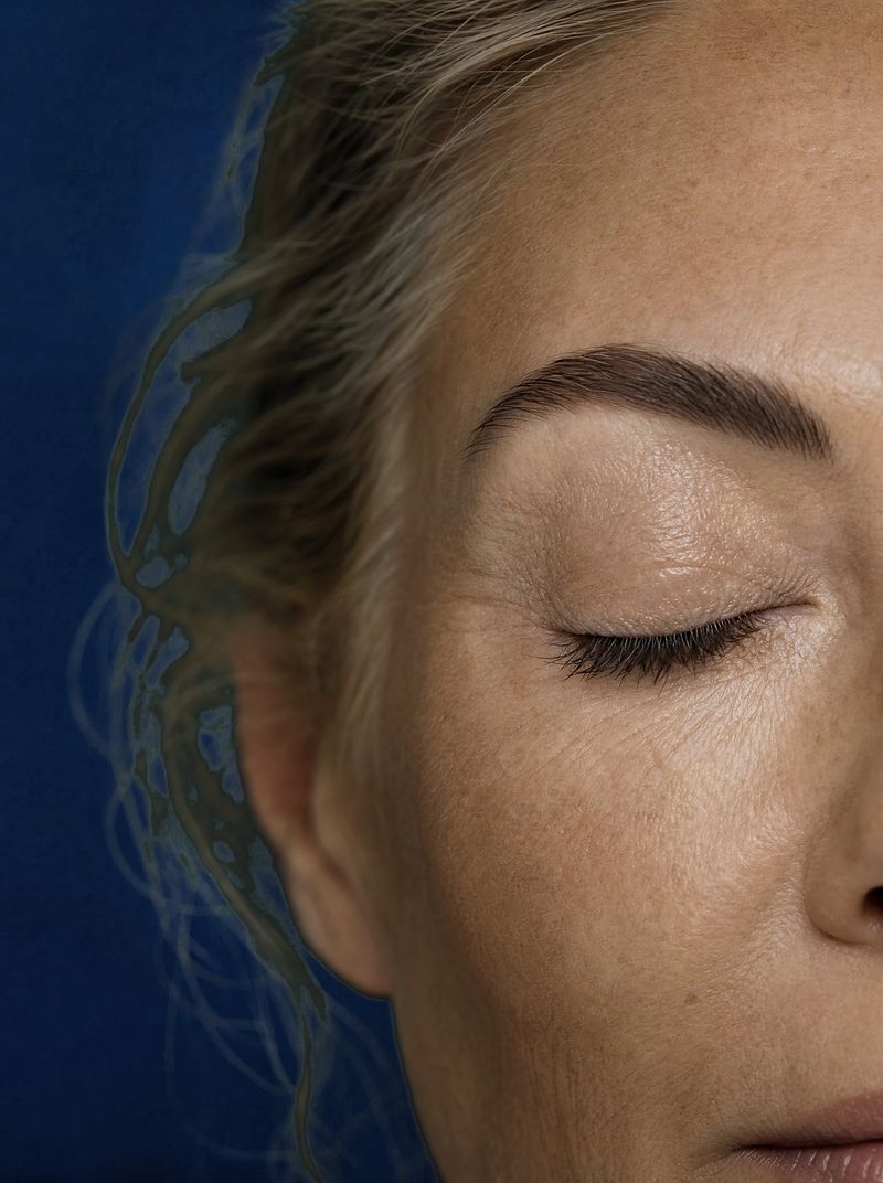 Close-up of lifted lashes and softly laminated brows
